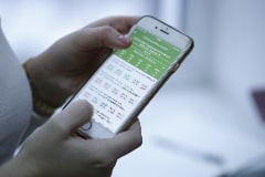 Person holding a phone